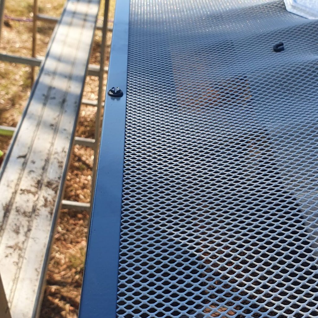 newly installed gutter guard mesh