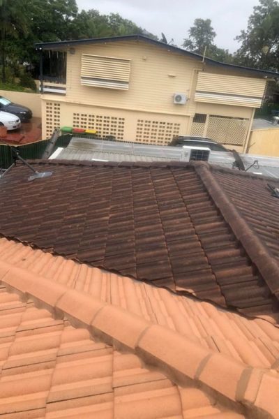 Pressure cleaning roof tiles before and after